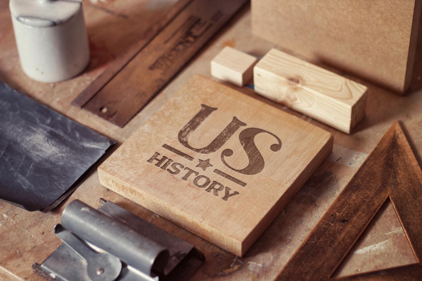 The US History mark engraved in wood